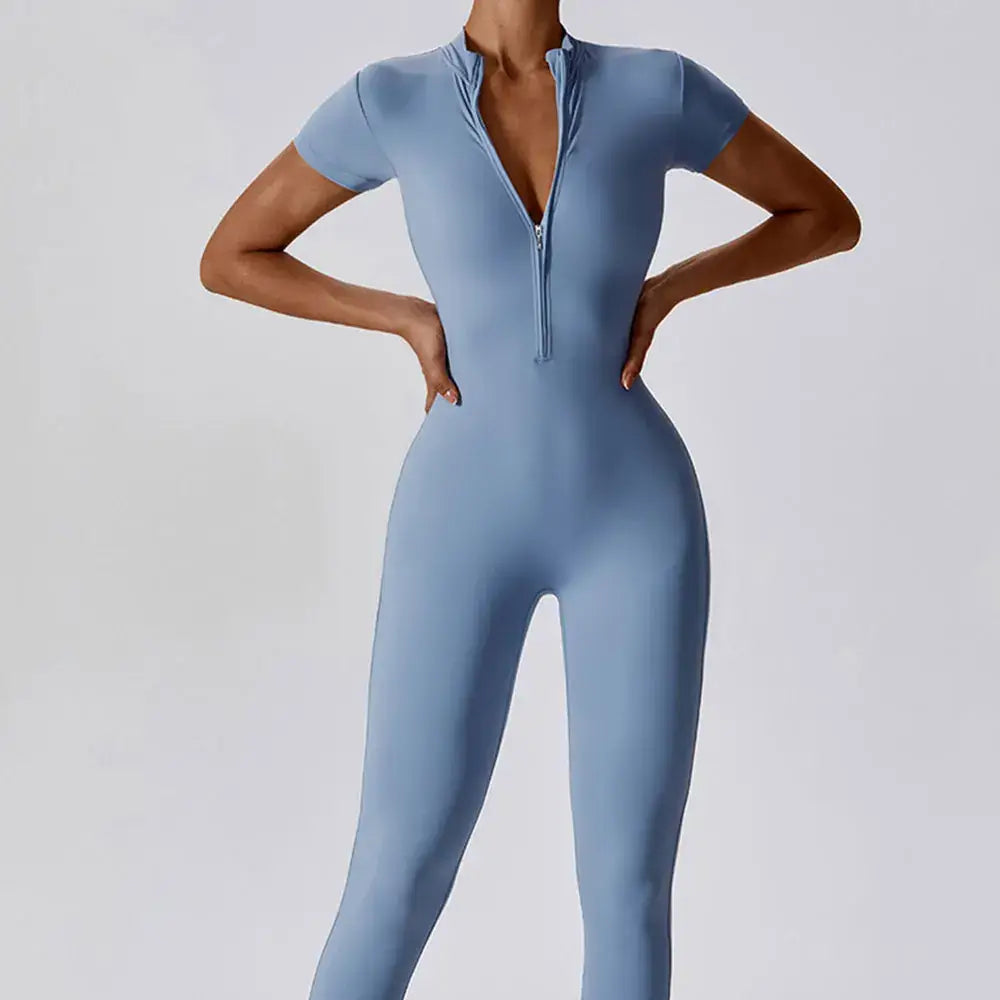 Women’s Tactical Bodysuit by Savage Combat – seamless zip-up compression-fit gymwear for MMA, fitness, and streetwear drops